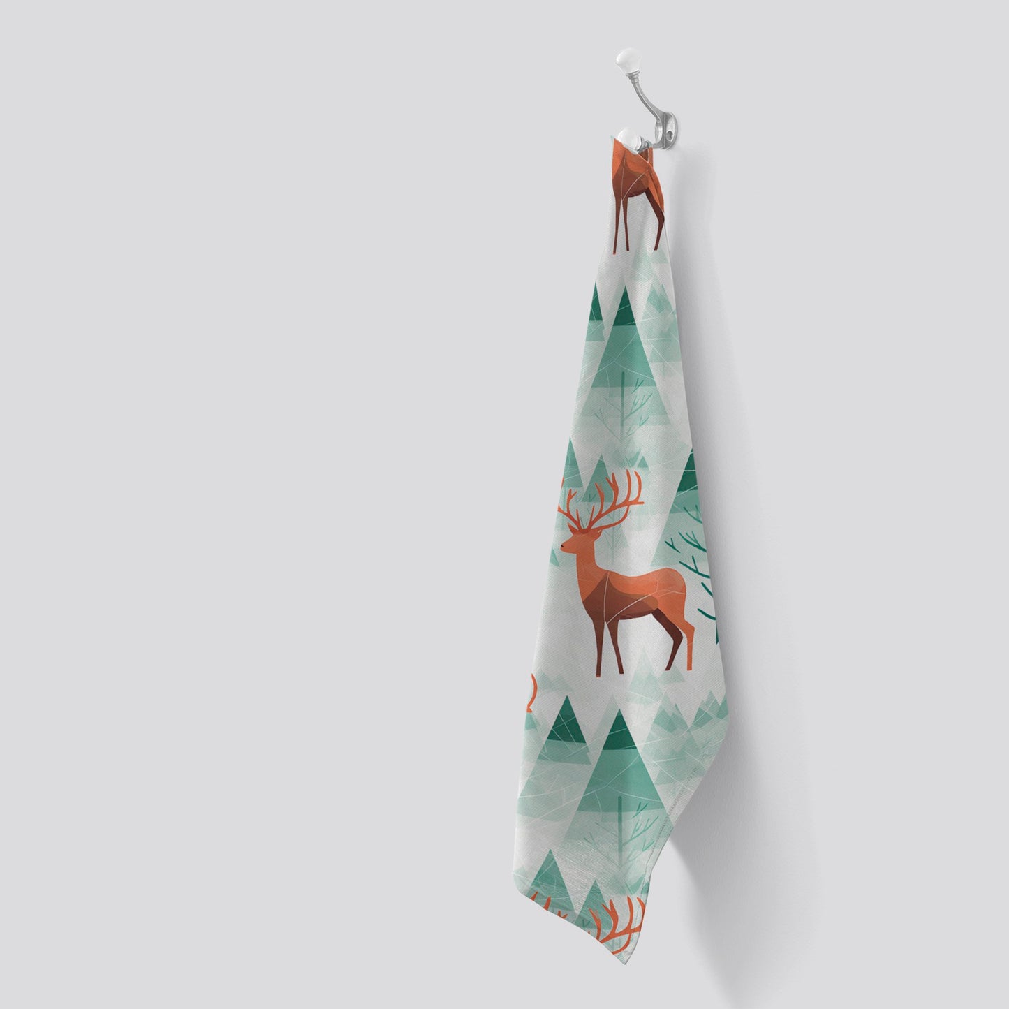 Reindeer On A Snowy Landscape Tea Towel