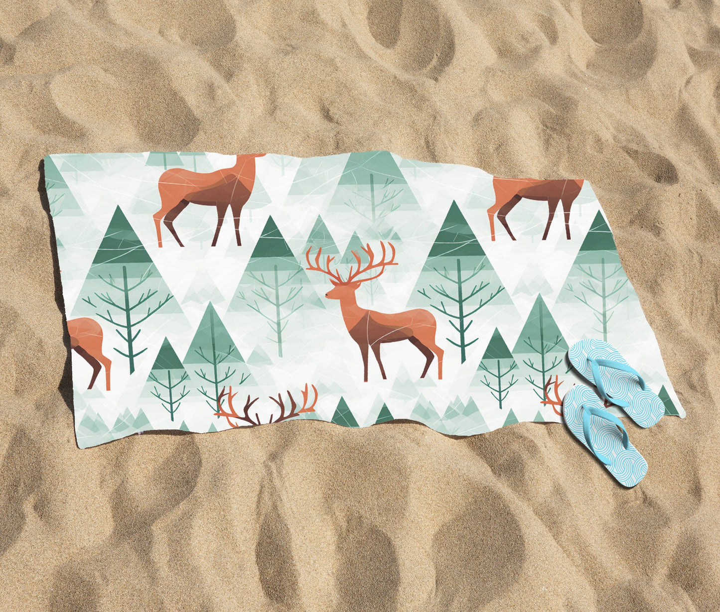 Reindeer On A Snowy Landscape Beach Towel