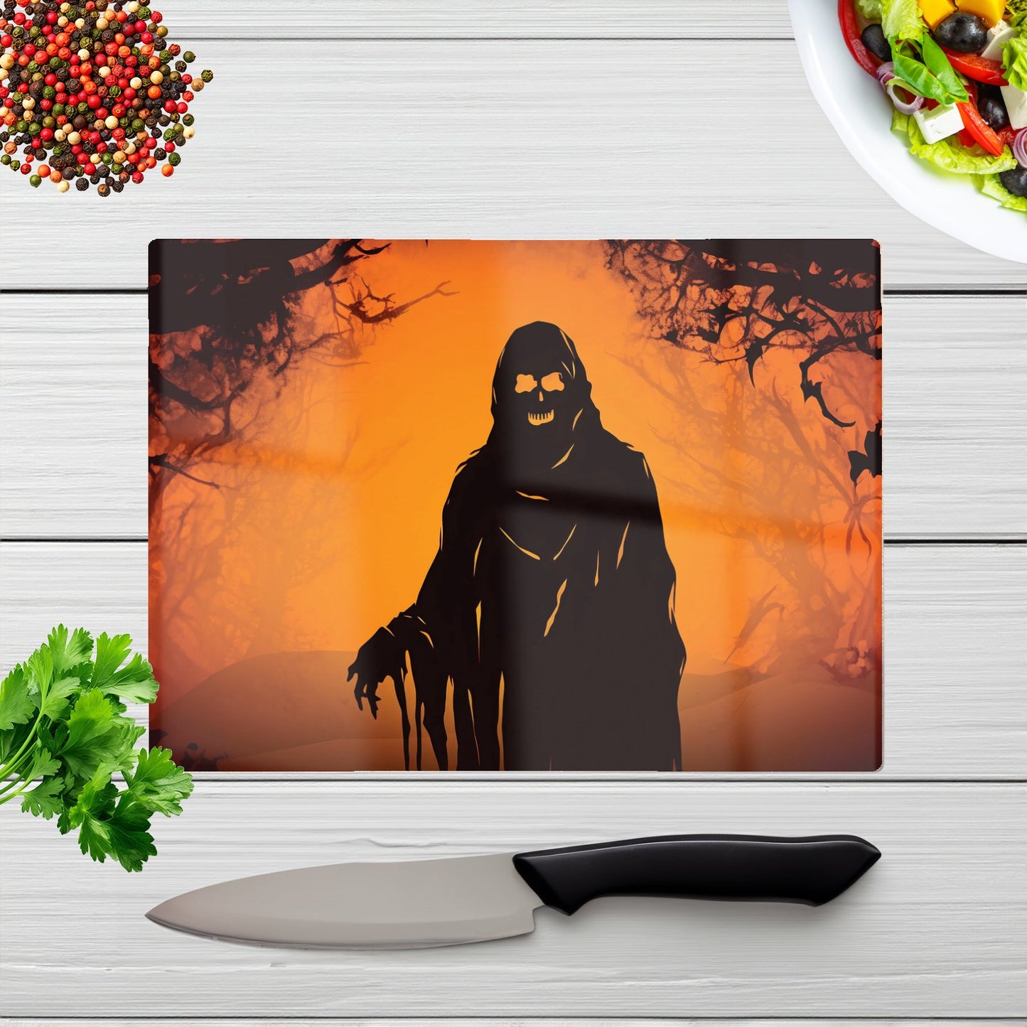 A Spooky Black And Orange Ghost Glass Chopping Board