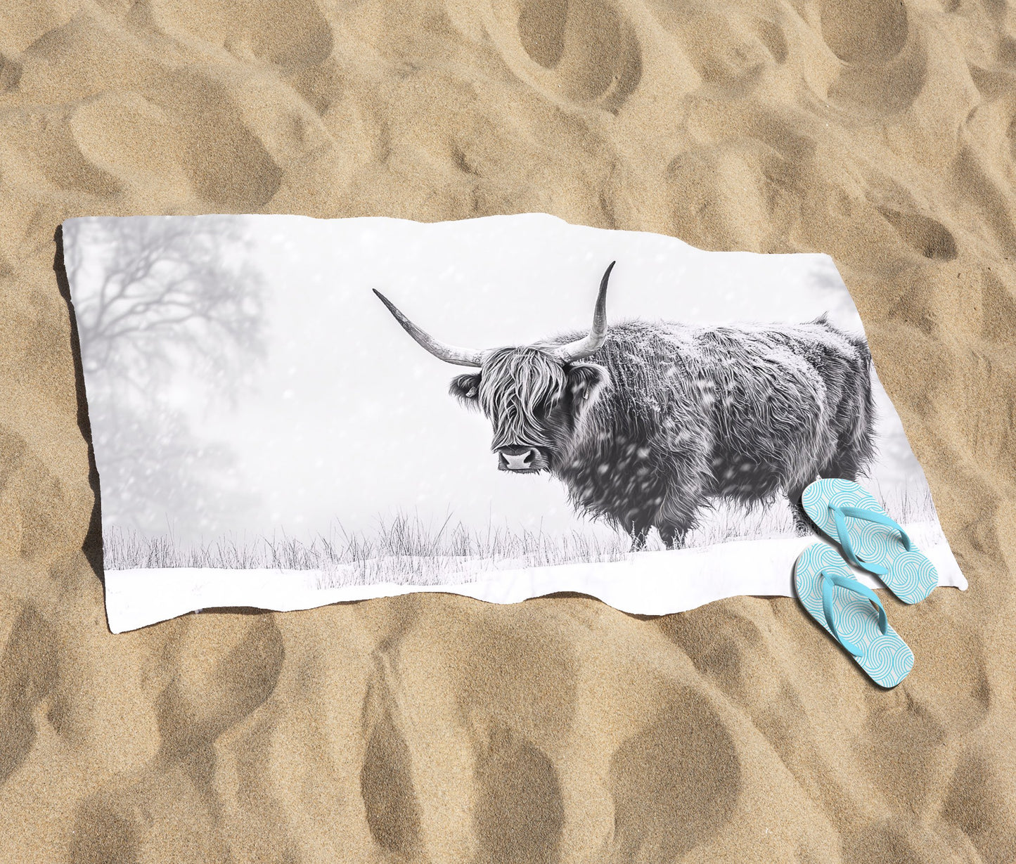 Snowy Black And White Highland Cow Beach Towel