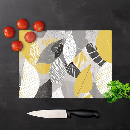 Grey Yellow Autumn Leaves Glass Chopping Board