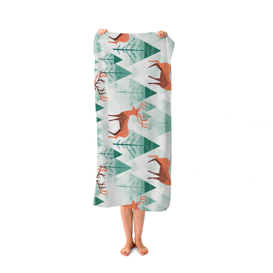 Reindeer On A Snowy Landscape Beach Towel