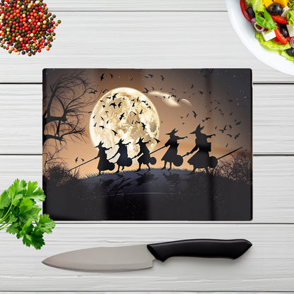 Witches Riding Broomsticks Glass Chopping Board