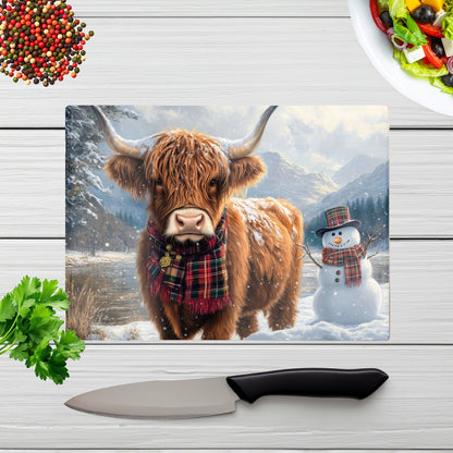 Highland Cow And A Snowman Chopping Board