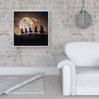 A Group Of Witches Riding Broomsticks Framed Canvas