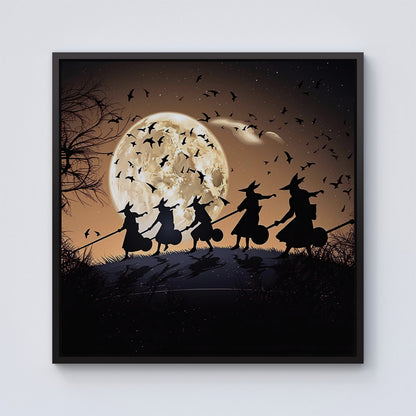 A Group Of Witches Riding Broomsticks Framed Canvas