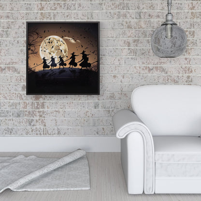 A Group Of Witches Riding Broomsticks Framed Canvas
